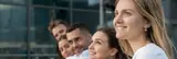 Group of diverse individuals smiling.