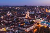 A captivating view of Vilnius, during dusk, showcasing the city's enchanting beauty as the sun sets
